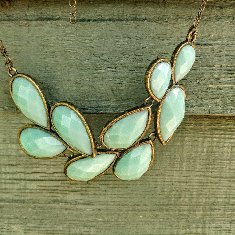 Gold and light turquoise colored necklace 9" long